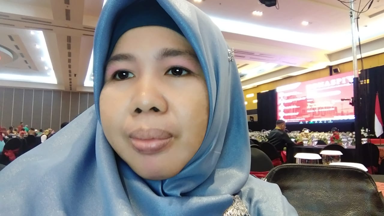 Dr. Rahmatiah, M.Si